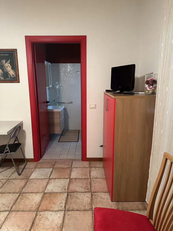 Camera classica con televisione presso l'Agriturismo Al Buttasella a Lavariano di Mortegliano (UD).